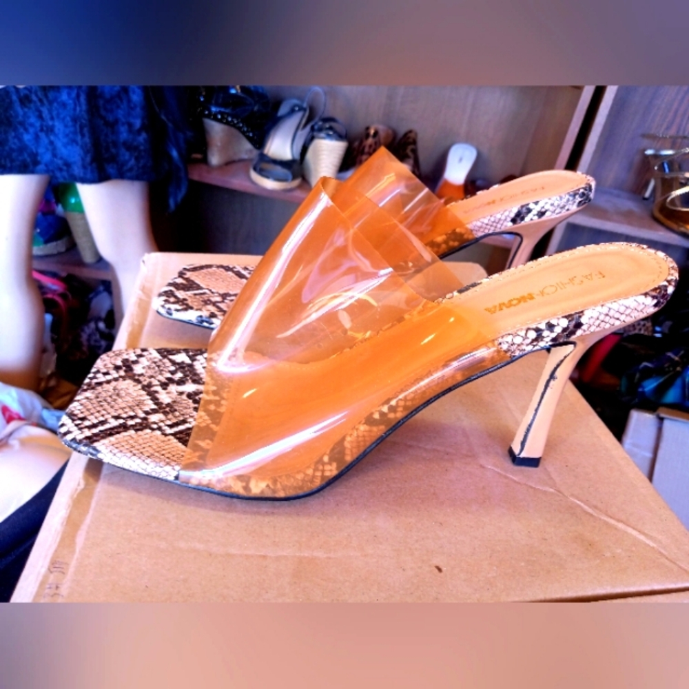 Light brown transparent snake print mules